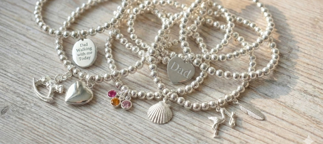 A collection of sterling silver beaded bracelets with charms to represent special moments