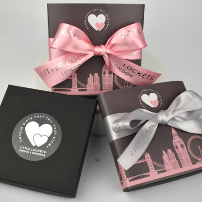 Your choice of gift wrap - free logo box or upgrade to a London wrap and pink or grey ribbon tie