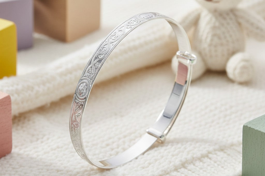 Sterling silver adjustable bangle with Celtic design