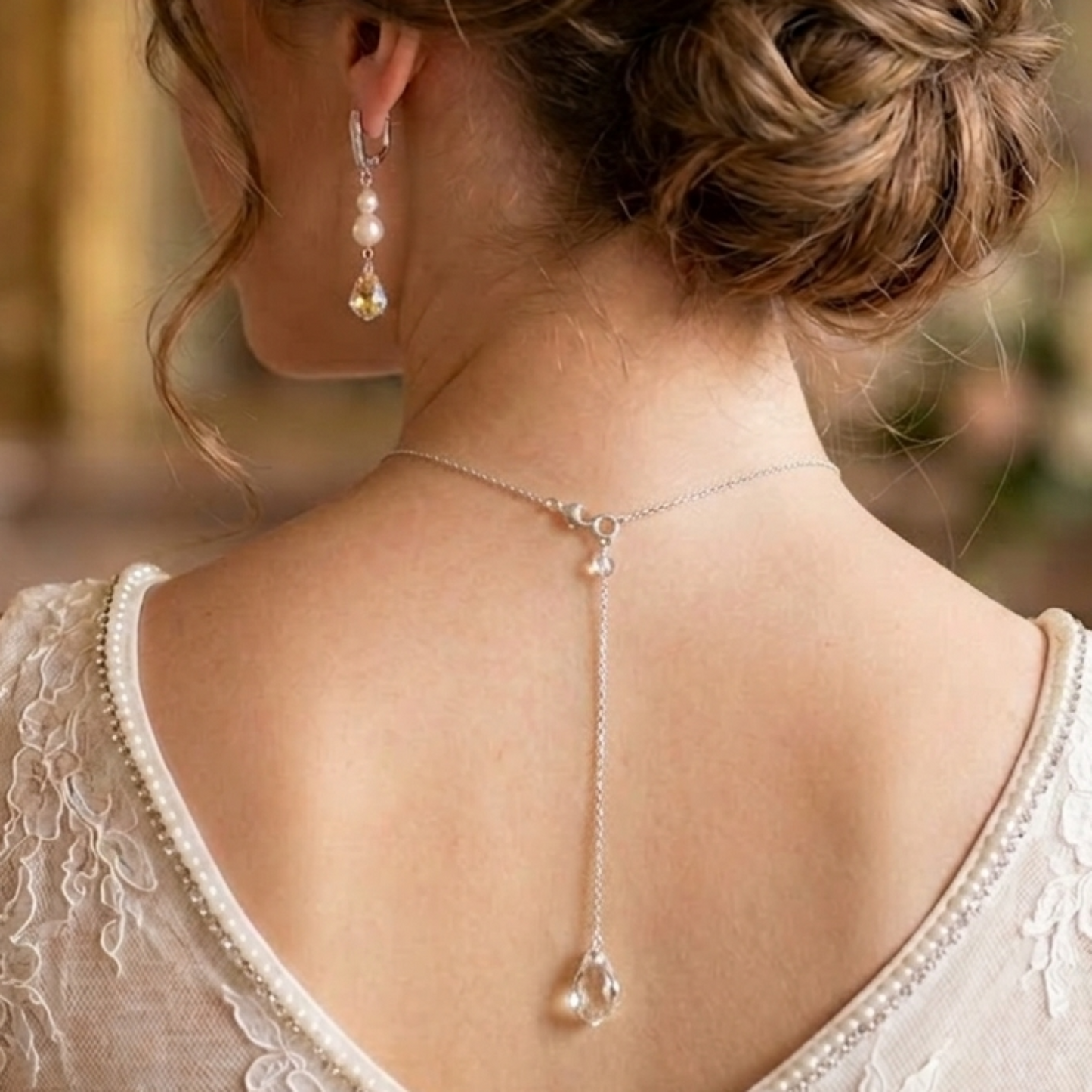 Baroque style crystal drops combine with freshwater pearls to make this combination of pearl drop earrings and a backdrop baroque necklace