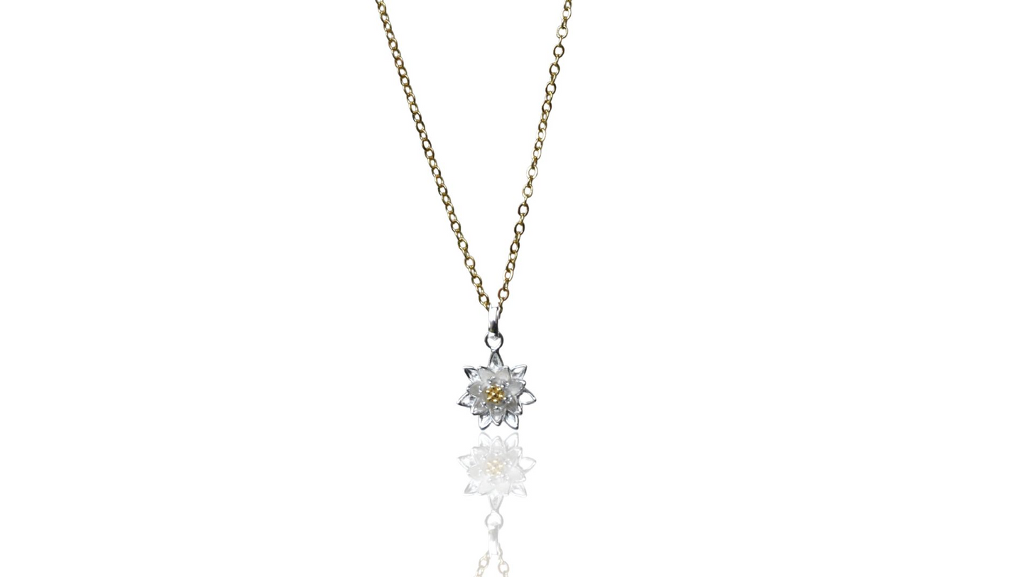 Daisy Birth Flower Necklace with a delicate pendant on a white background