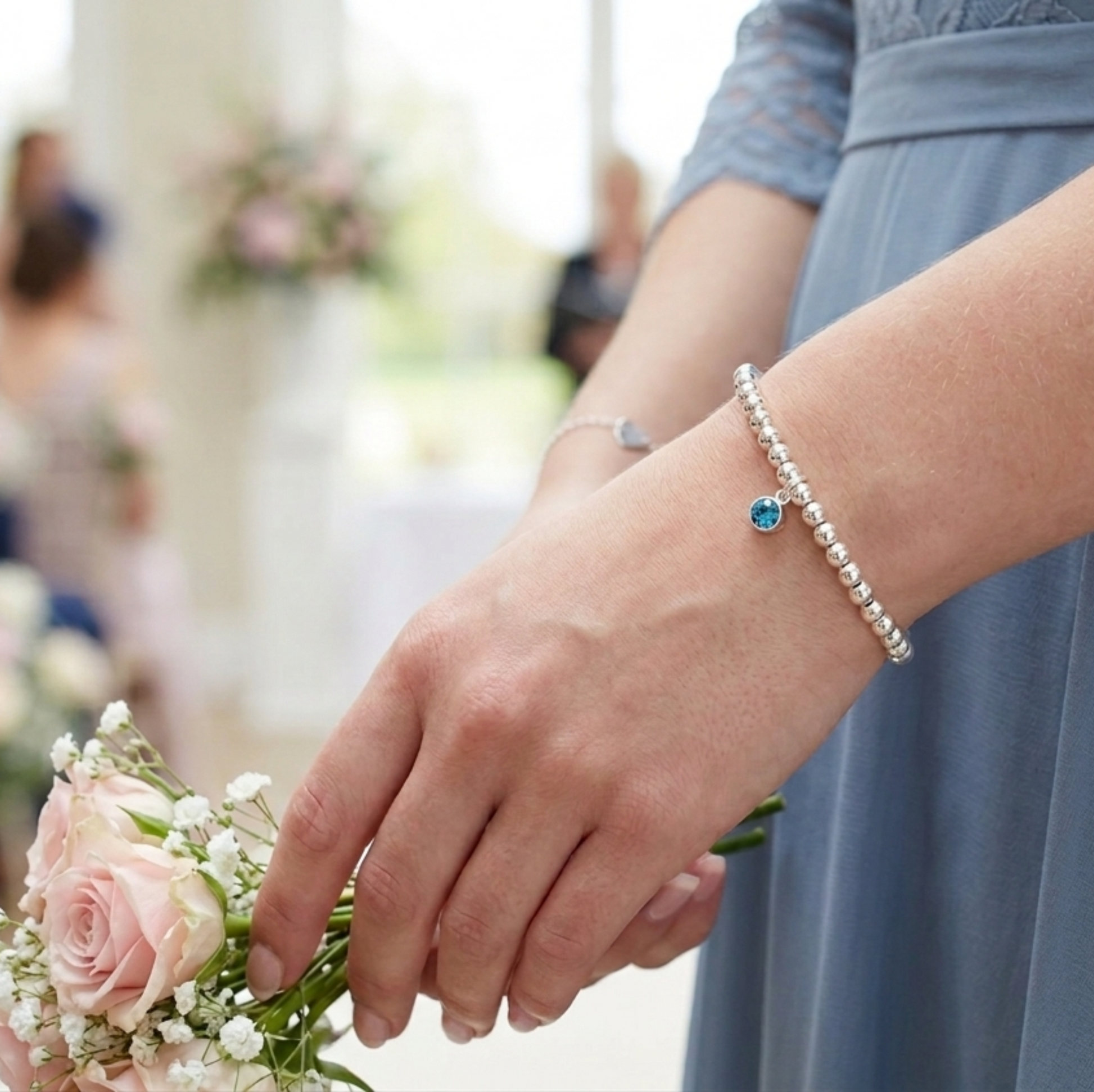 Our polished 4mm beaded bracelet shown with a September (sapphire) crystal birthstone. Elasticated in two sizes for easy fit.