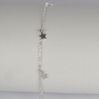 Boho Star Sterling Silver Anklet with Crystal Birthstone Charm. Crafted from sterling silver with flat cable chain links to sit comfortably. A secure fit, thanks to its 9 inch chain and a 1 inch extender.