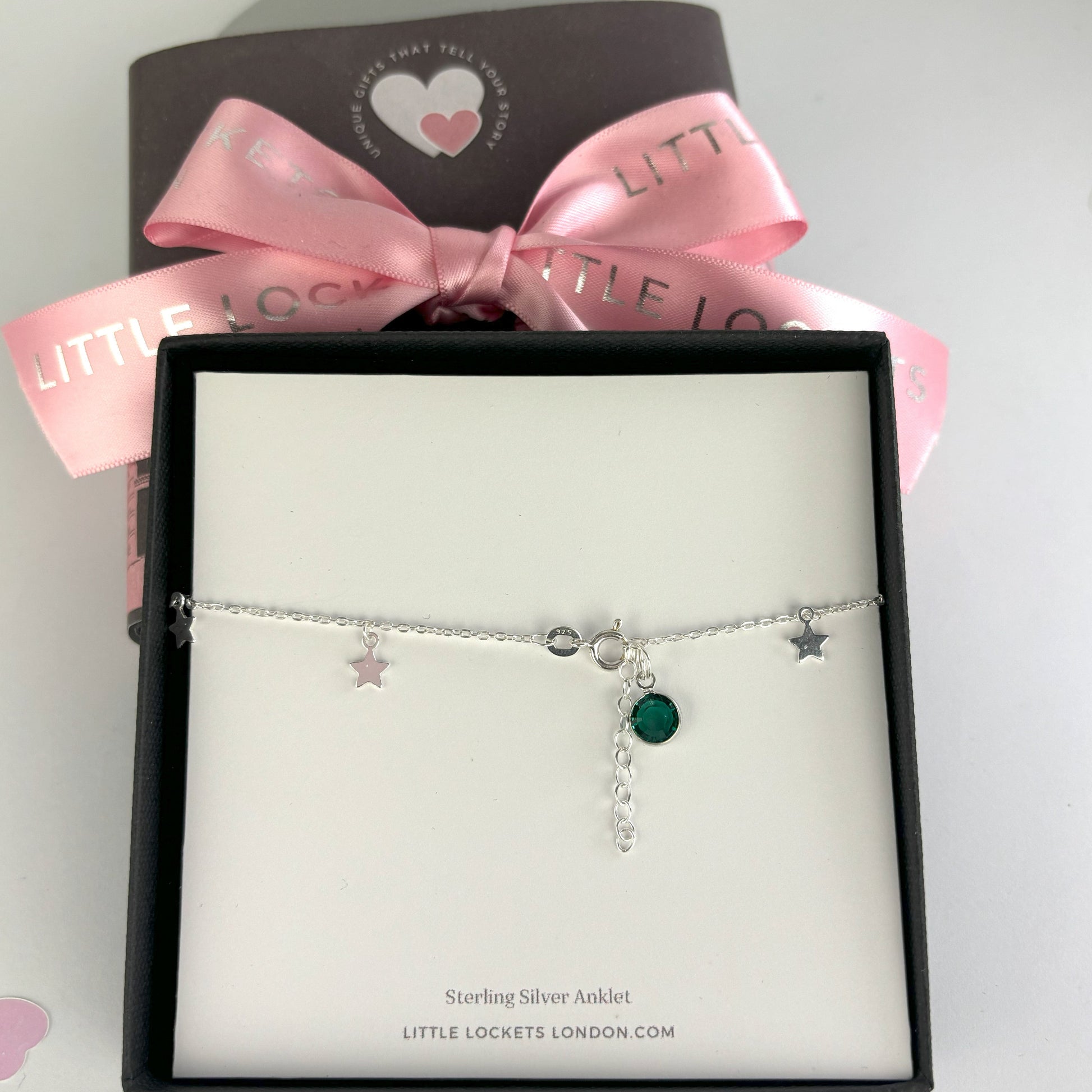 Boho Star Sterling Silver Anklet with Crystal Birthstone Charm. Crafted from sterling silver with flat cable chain links to sit comfortably. A secure fit, thanks to its 9 inch chain and a 1 inch extender.