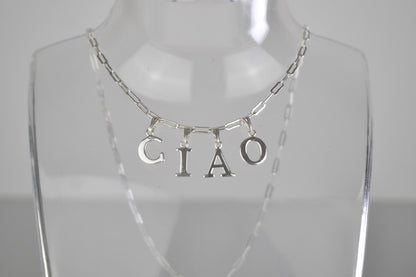 Ciao Sterling Silver Letter Necklace on a 16 inch drawn cable chain. On a bust.