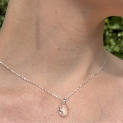 Our simple Baroque pendant features the highest quality crystal drop suspended from a sterling silver adjustable chain. The back of the necklace features two further bqroque drops, making it the perfect back drop necklace for wedding or cocktail dresses. Shown with  our freshwater pearl and crystal earrings (see separate listing).