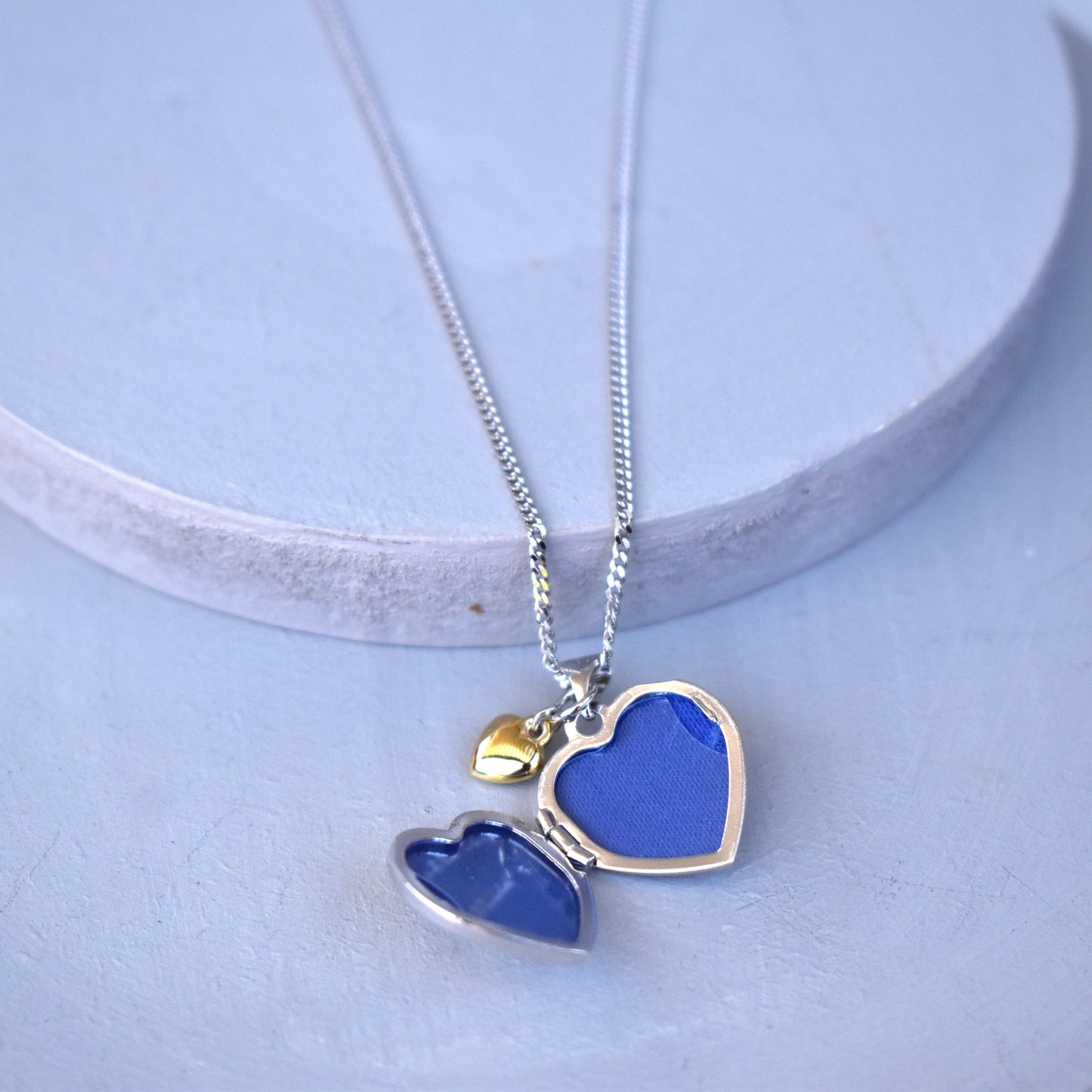 Personalised Sterling Silver & Gold Plated Diamond Heart Locket Necklace features a small inset diamond shown open with apertures for two photos