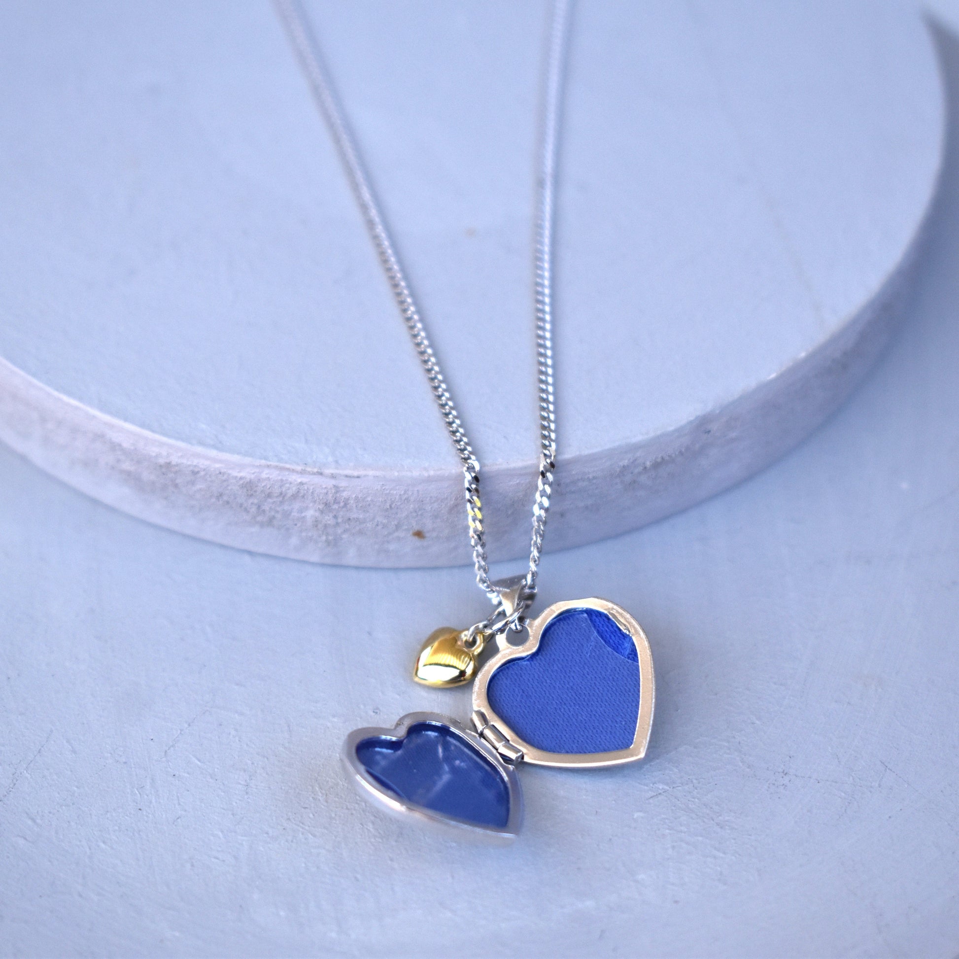 Personalised Sterling Silver & Gold Plated Diamond Heart Locket Necklace features a small inset diamond shown open with apertures for two photos