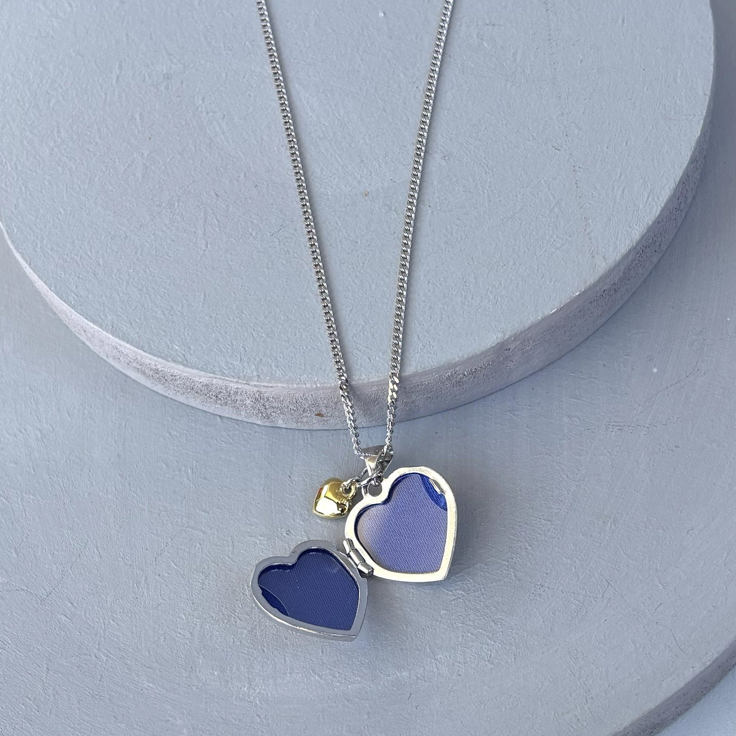 Personalised Sterling Silver & Gold Plated Diamond Heart Locket Necklace features a small inset diamond shown open with two photo apertures