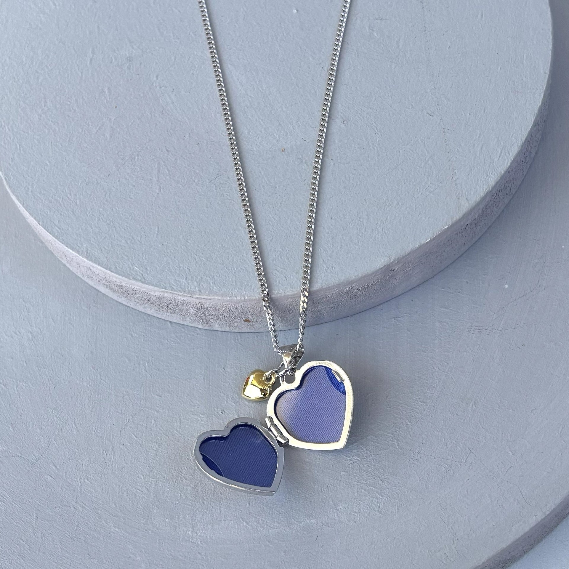 Personalised Sterling Silver & Gold Plated Diamond Heart Locket Necklace features a small inset diamond shown open with two photo apertures