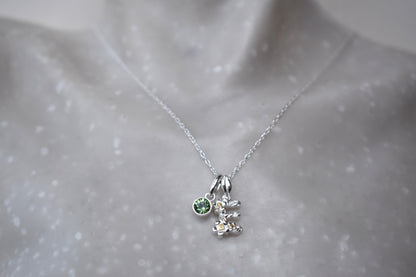 Alphabet Initial Pendant in two-tone sterling silver and 18ct yello gold plate shown with optional sterling silver and premium crystal birthstone