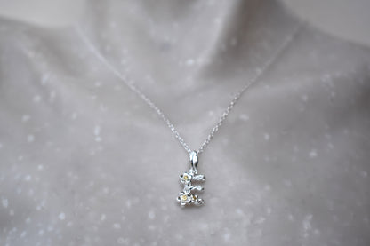Alphabet Initial Pendant in two-tone sterling silver and 18ct yello gold plate shown with optional sterling silver and premium crystal birthstone