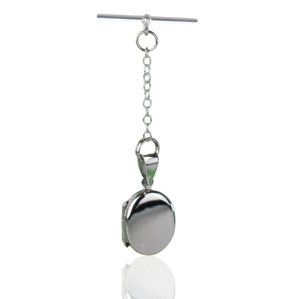 Sterling silver oval photo pocket locket shown with t bar fastening
