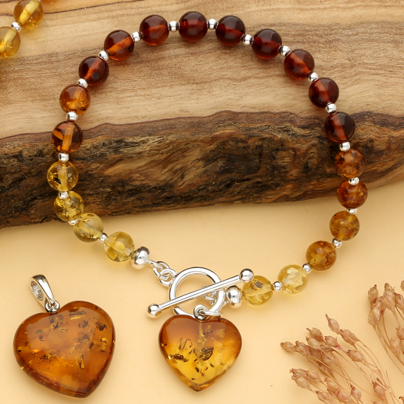 Cognac amber bracelet fastened with sterling silver TBar clasp. 