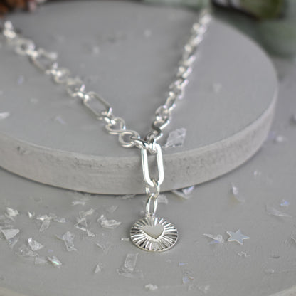 Sterling silver infinity link necklace with sunburst pendant