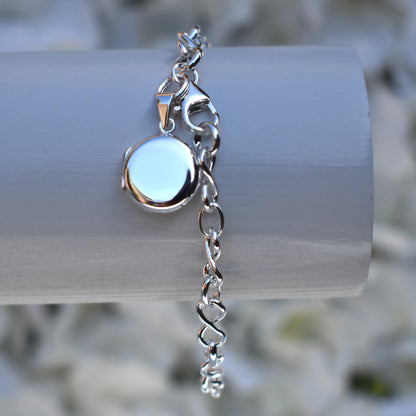 Sterling silver miniature locket on infinity link bracelet