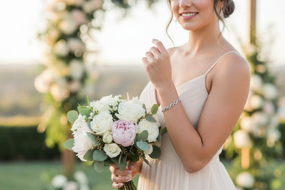 Bridesmaid wears Sterling silver Infinity link bracelet with cubic zirconia inlays. Adjustable.