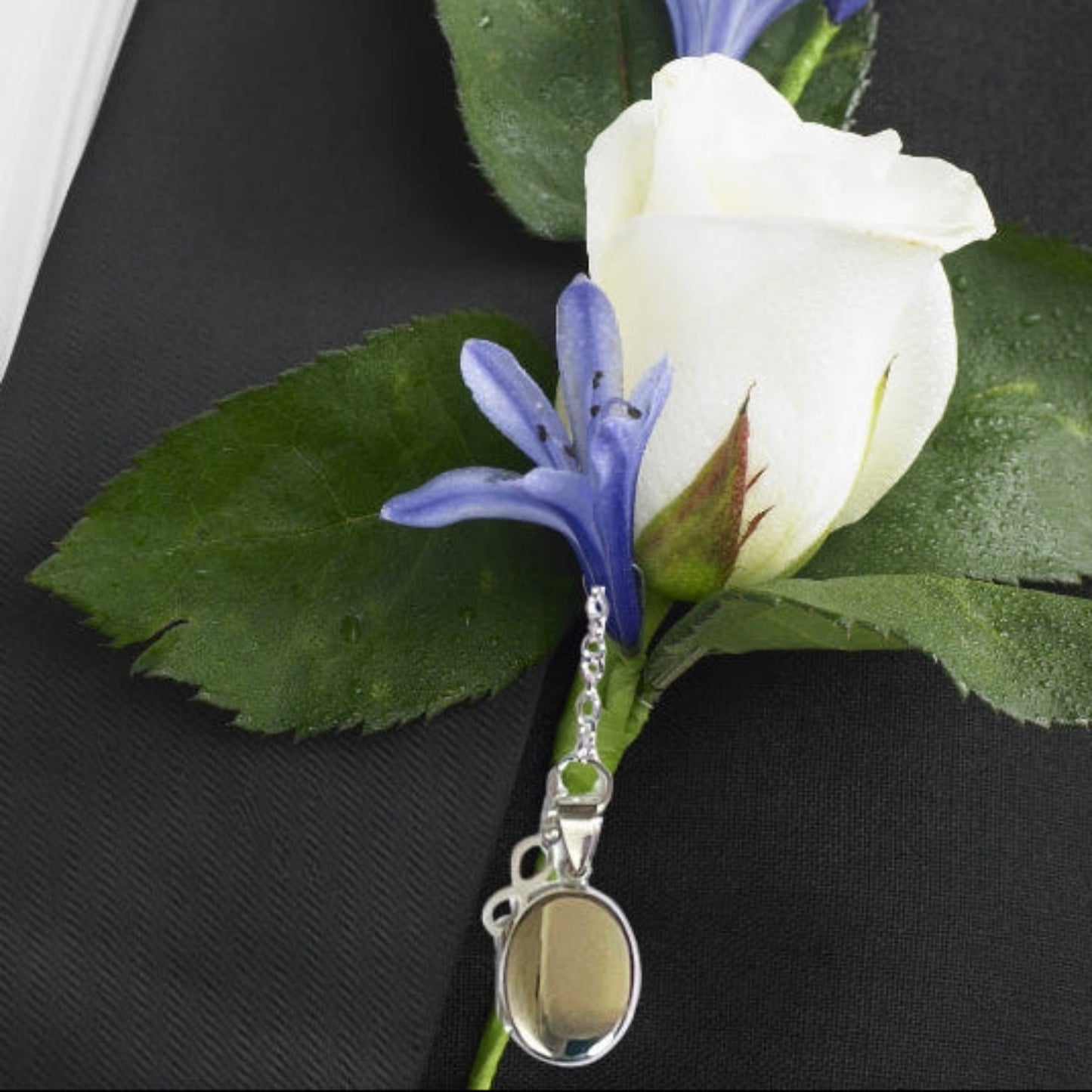 Infinity symbol locket for two photos, discreet jacket accessory