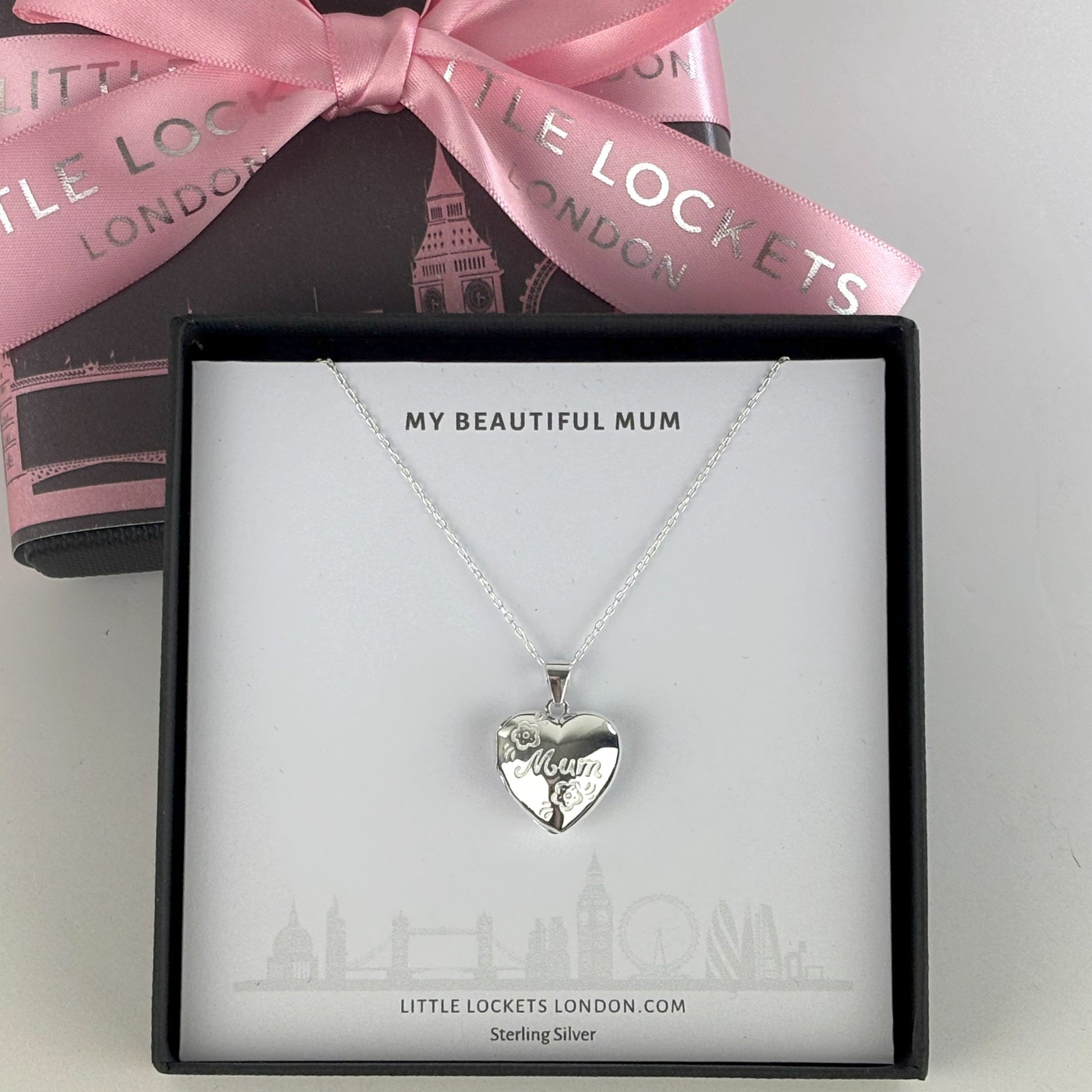 Heart shaped photo locket features delicate flowers engraved on the front, along with Mum. Crafted from high-quality sterling silver, it comes with a 16-18 inch extendable chain shown in gift box
