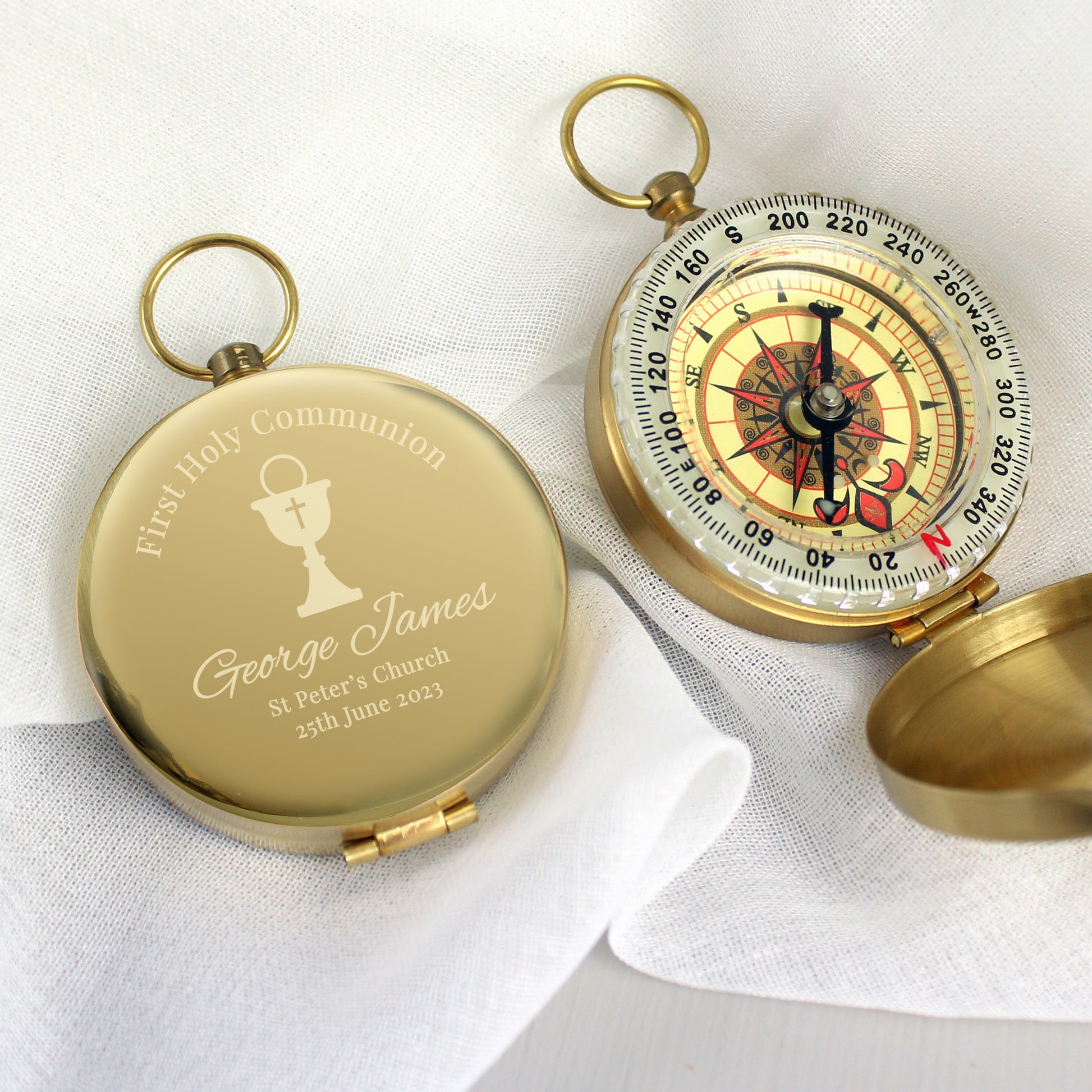 Full compass in brushed metal effect case, engraved with First Holy Communion and an etched chalice with cross. can bepersonalised with a name and message of your choice