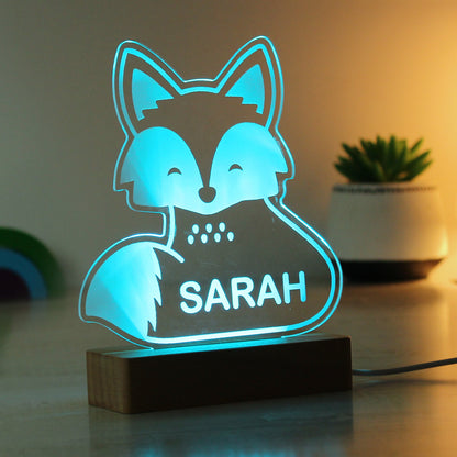 Childs LED light on wooden base. Fox  personalised with your child's name. Changing or fixed colour and brightness settings. Shown in blue