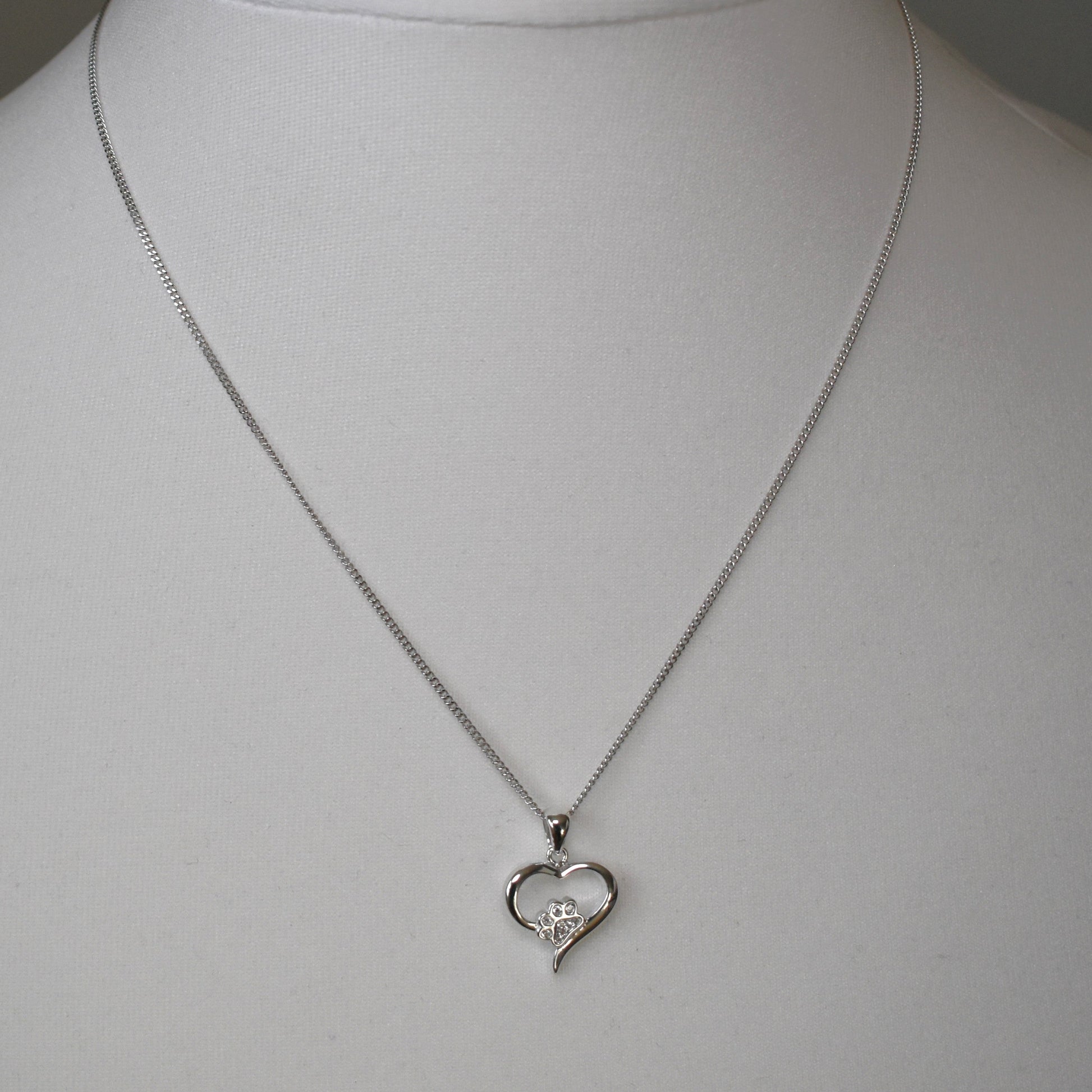Silver heart shape necklace with crystal cubic zirconia paw print on 18" sterling silver diamond cut chain