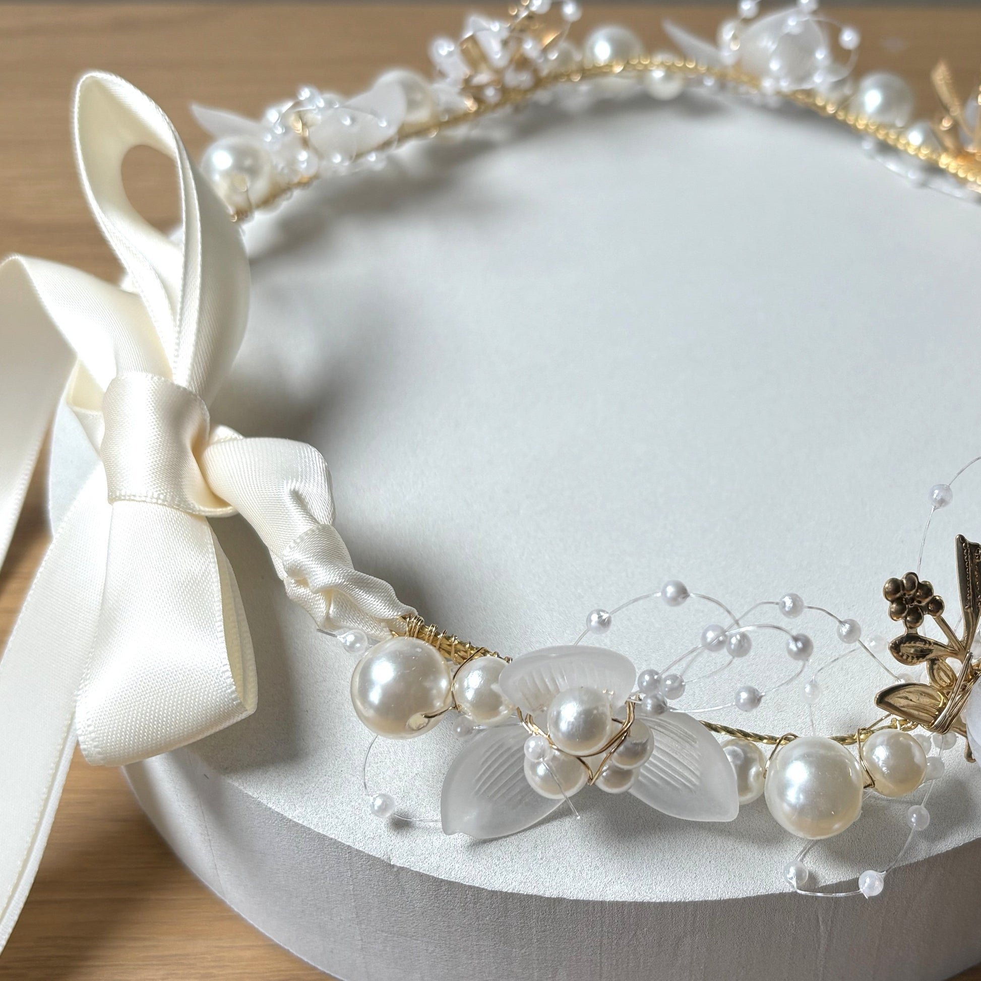 Pearl beaded dog collar tied with satin ribbon