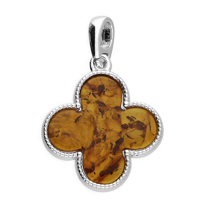 Four-leaf clover pendant with amber center on a white background