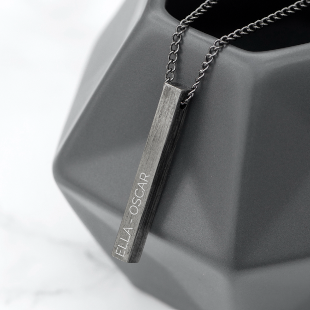 Gunmetal grey bar on gunmetal chain. Bar is engraved with the name of your choice.