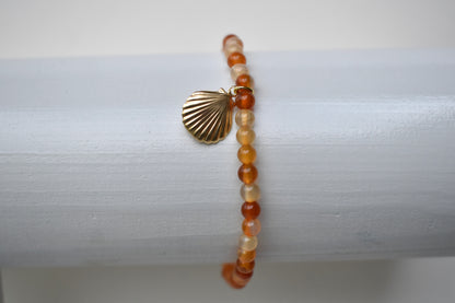 Carnelian elasticated bracelet with sterling silver gold plated shell