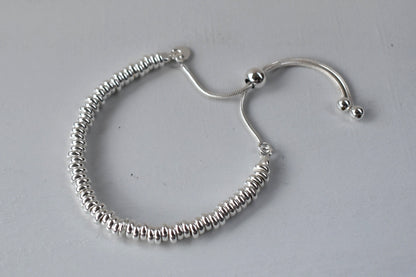 All Silver Rings Slider Bracelet sterling silver rings and a secure ball fastening, it offers a perfect fit and effortless sophistication