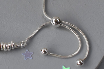 All Silver Rings Slider Bracelet sterling silver rings and a secure ball fastening, it offers a perfect fit and effortless sophistication