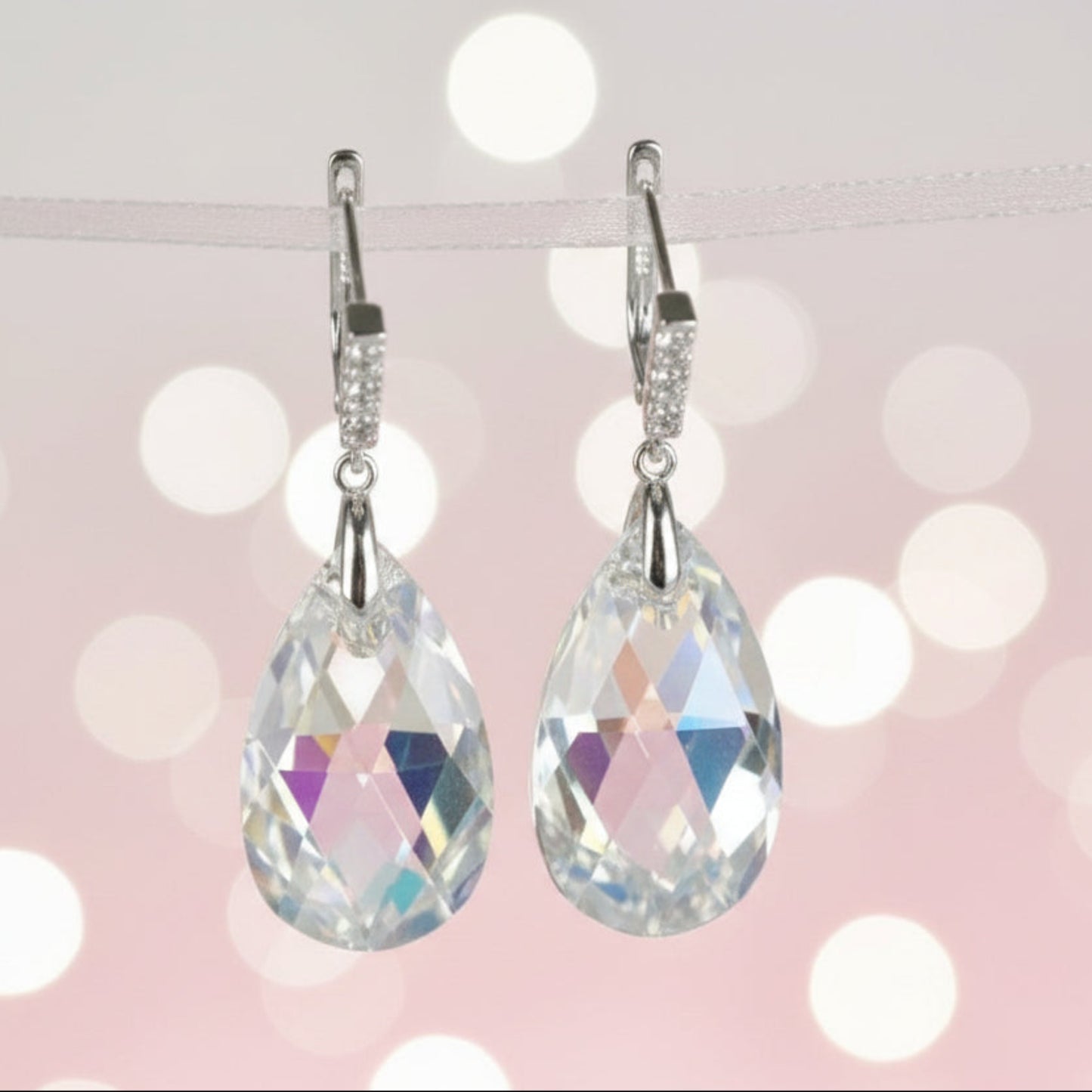 Pear drop earrings shown in sterling silver option