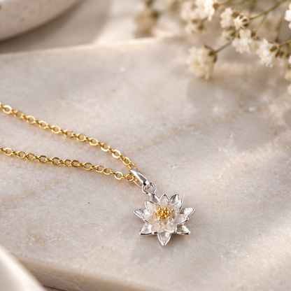 Gold Daisy Birth Flower necklace with a silver pendant