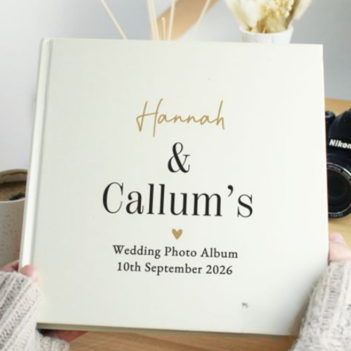 Square wedding photo album with gold and black personalisation
