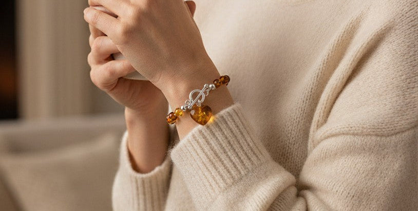 Amber beaded bracelet with T-bar fastening and a beautiful amber heart charm
