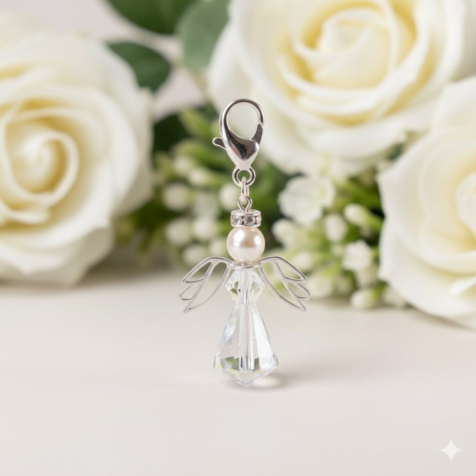 Sterling silver and crystal angel caribiner to be attached to wedding bouquets, wedding purses or the dress itself