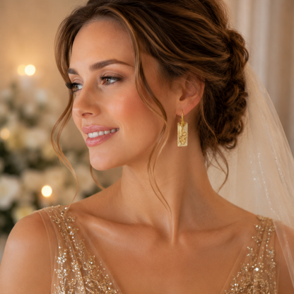 Gold growing crystal earrings shown on a bride
