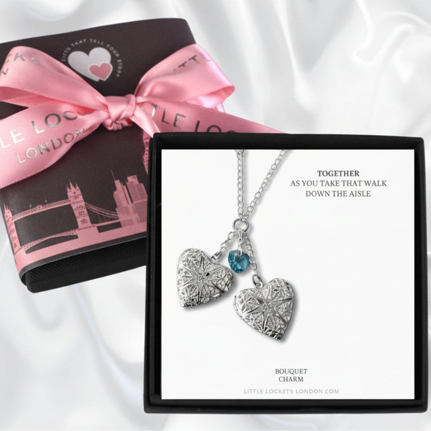 Double heart locket wedding bouquet charm with blue crystal heart. Gift boxed with your choice of message.