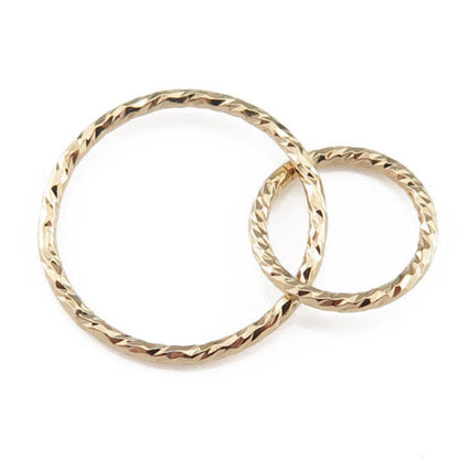 Close up showing the entwined gold circles