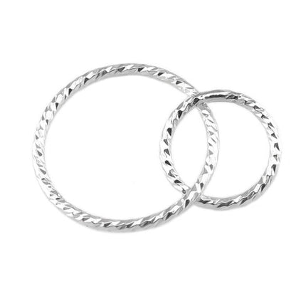 Sterling silver entwined circles, cut to give an extra sparkle.