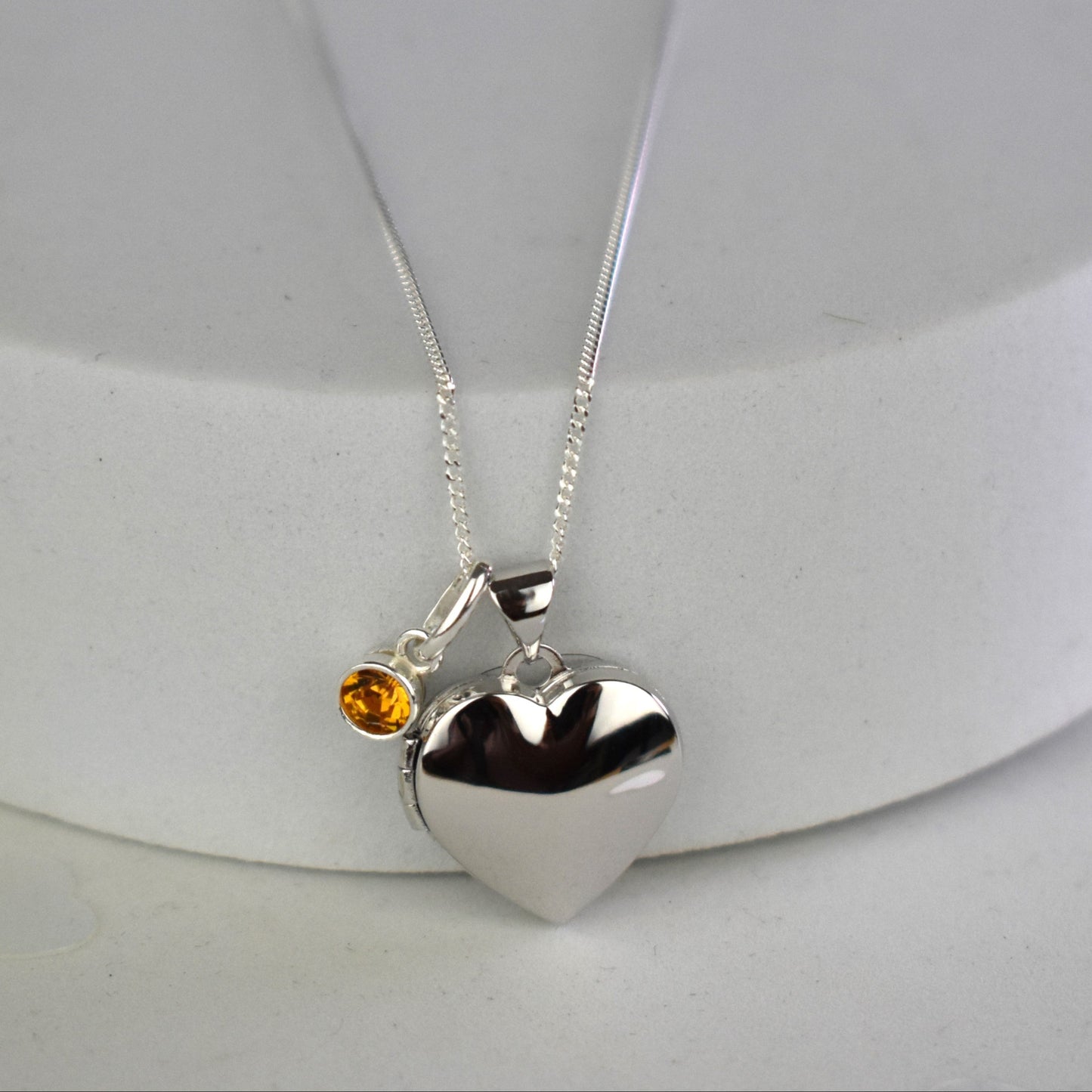 Children’s first locket with optional birthstone charm