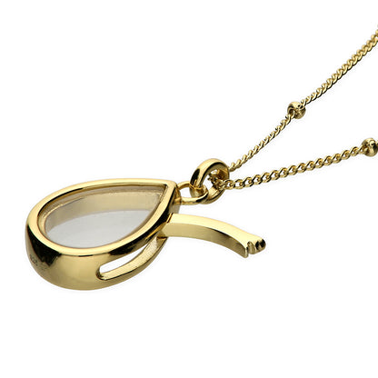 A gold peare shape glass locket for charms, suspended from a gold beaded chain. Shown with the hinge opening for adding collectable mini charms