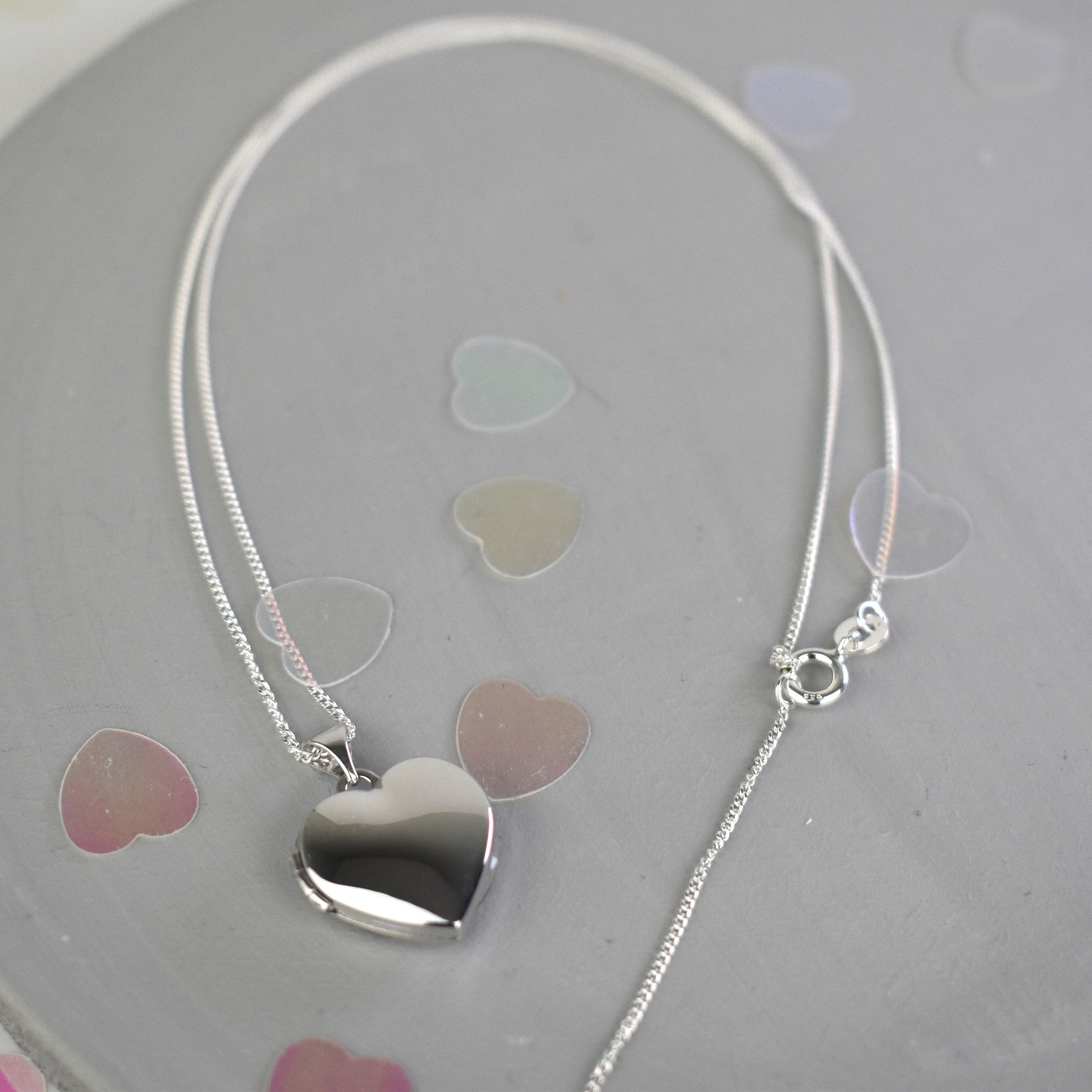 Silver heart-shape first locket on sterling silver chain
