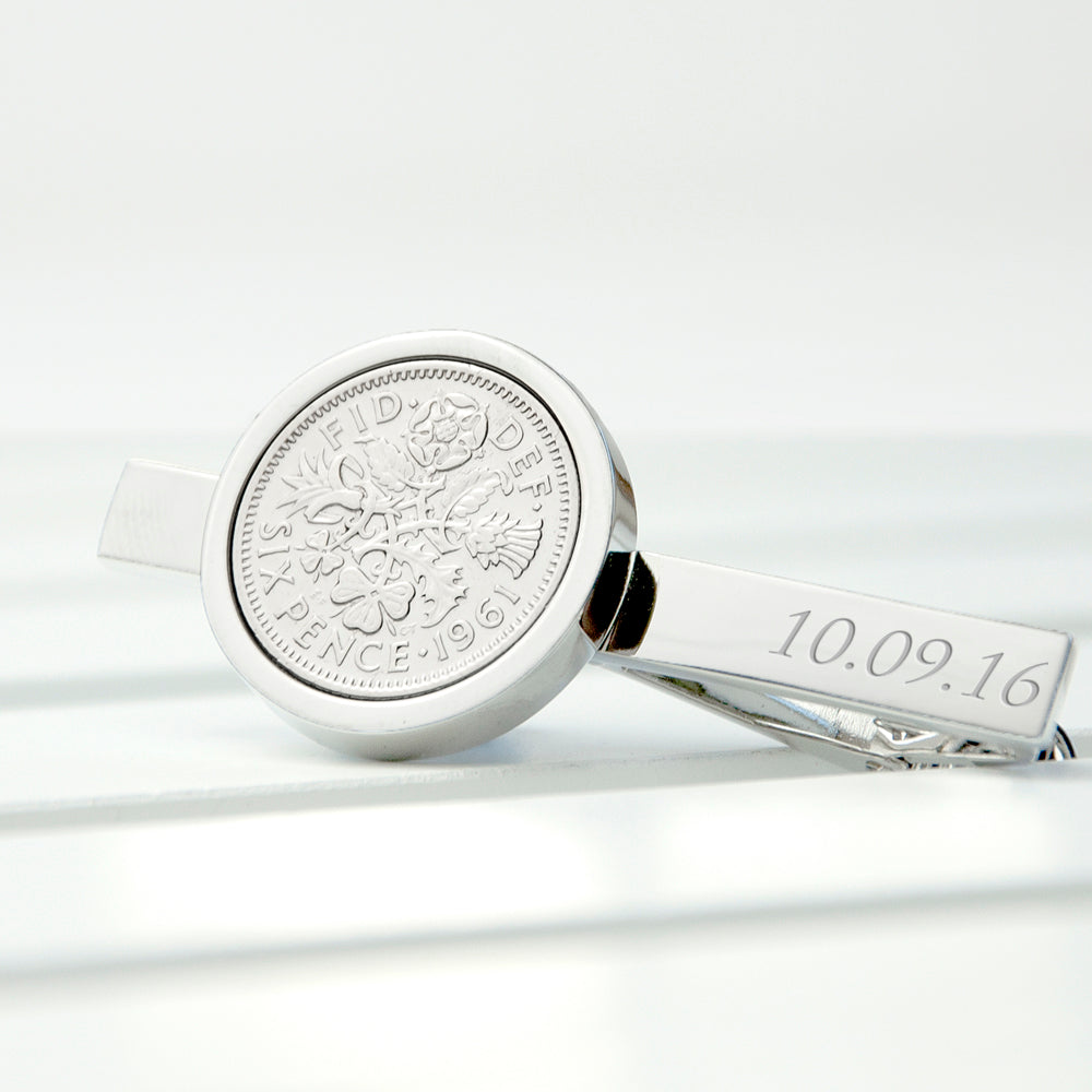 silver plated tie pin with traditonal british sixpence and engraved name, shown on tie