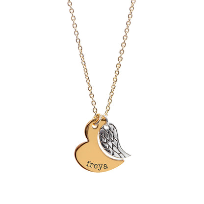 Gold plated angel wing charm is hung next to a partially formed silver plated heart. Together they complete the heart shape. Gold part of heart can be engraved with a name of your choice.