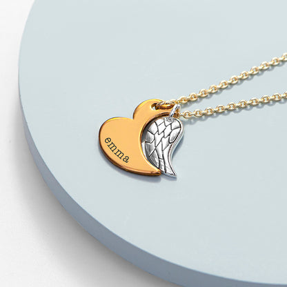 Gold plated angel wing charm is hung next to a partially formed silver plated heart. Together they complete the heart shape. Gold part of heart can be engraved with a name of your choice.