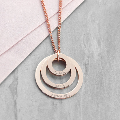 Three ring necklace shown in gold finish, each graduating-sized ring bears an engraved name of your choice,