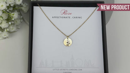 delicate Gold Filled Birth Flower Pendant. Crafted on an 11mm coin pendant, this simple piece is engraved with the intricate design of birth flowers on the front side and on the reverse side features a hidden personalised engraving, making it truly unique.