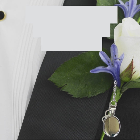 Sterling Silver Men's Photo Locket with a sterling silver Infinity charm. The Infinity charm makes a beautiful statement meaning everlasting, eternal and never-ending. The locket can hold up to two photographs.